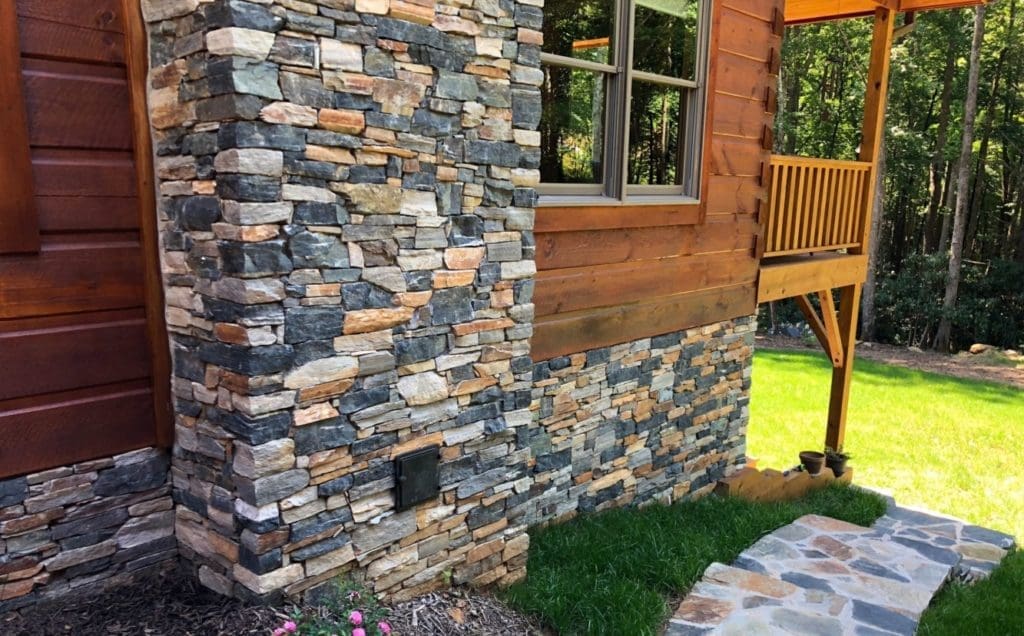 Verona drystack natural stone veneer chimney and wainscoting