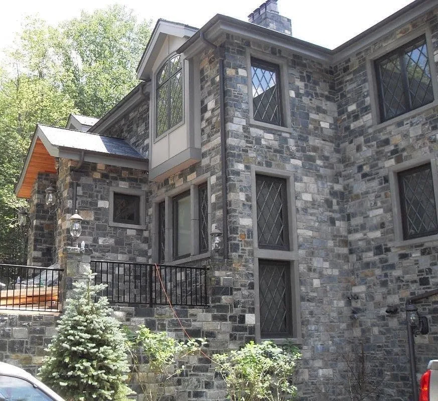Exterior with Carlisle castle rock real stone veneer