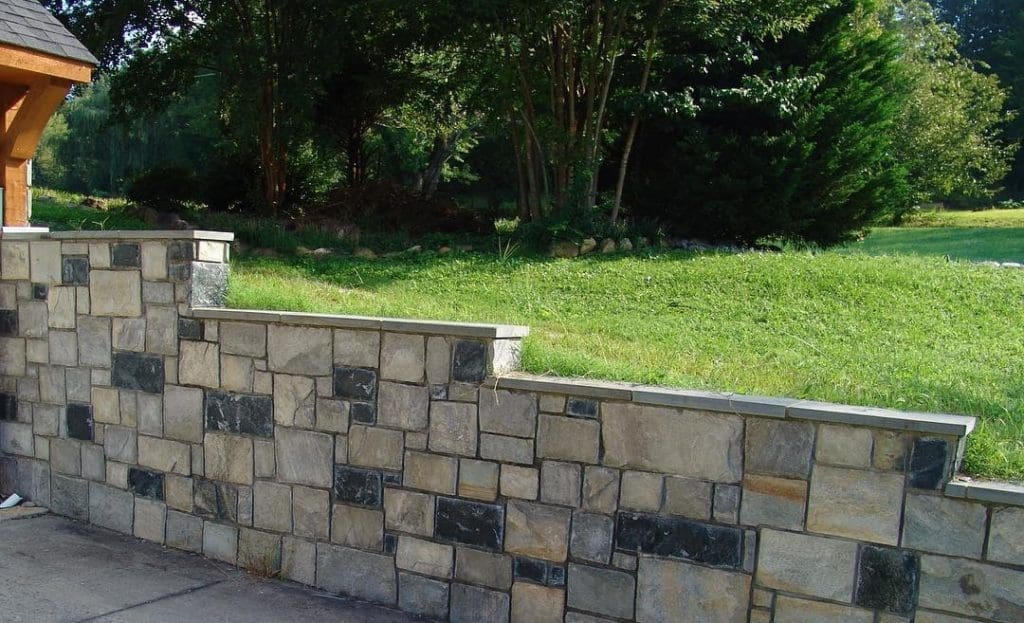 Driveway Retaining Wall with Carlisle and Springfield custom blend natural stone veneer