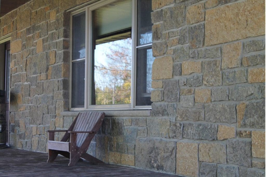 Front porch accent wall with Castle Ridge and Baltic Hills natural stone veneer