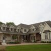 Exterior with Promenade tumbled natural thin stone veneer