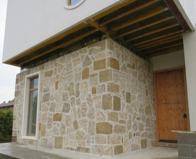 Colonial and Chateau with Large Pieces Real Stone Veneer Exterior