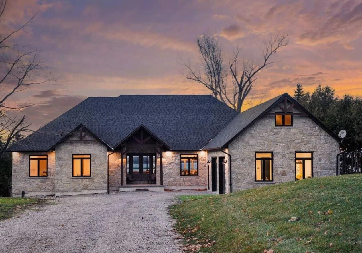 Chateau Real Thin Stone Veneer Lake House Front View